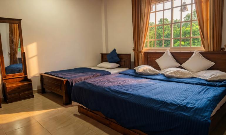 Luxury Family Suite (1 King + 1 Double)